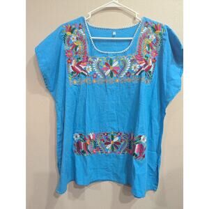 Light blue sleeveless Mexican style top w/floral embroidery size L